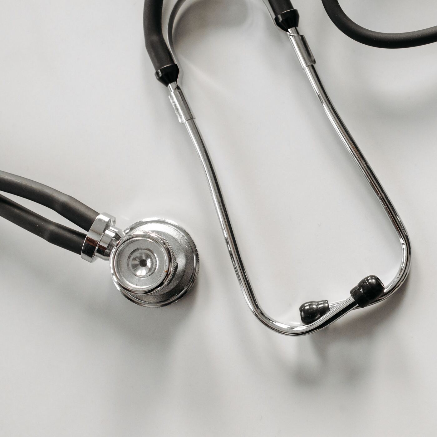 Stethoscope on a white surface